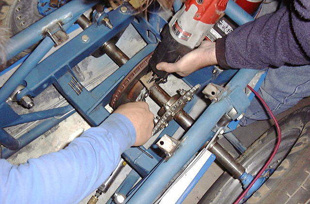 Cutting off a galled stainless steel bolt from the disk brake.
